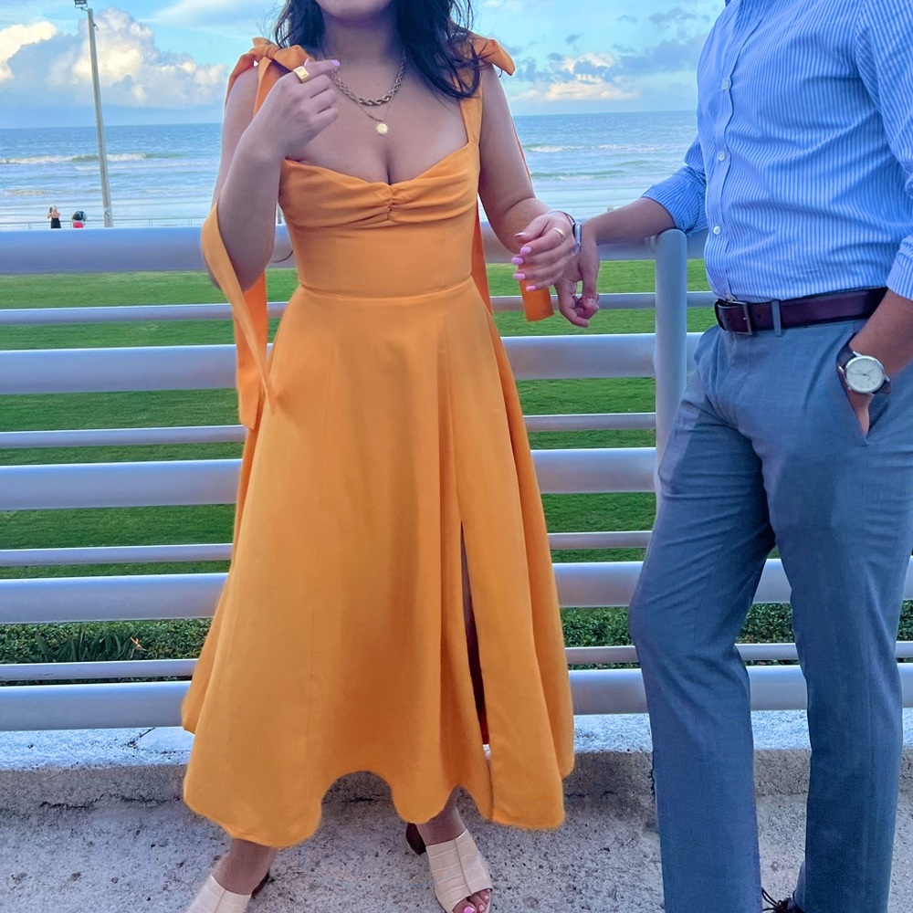 Alicia house of CB orange dress